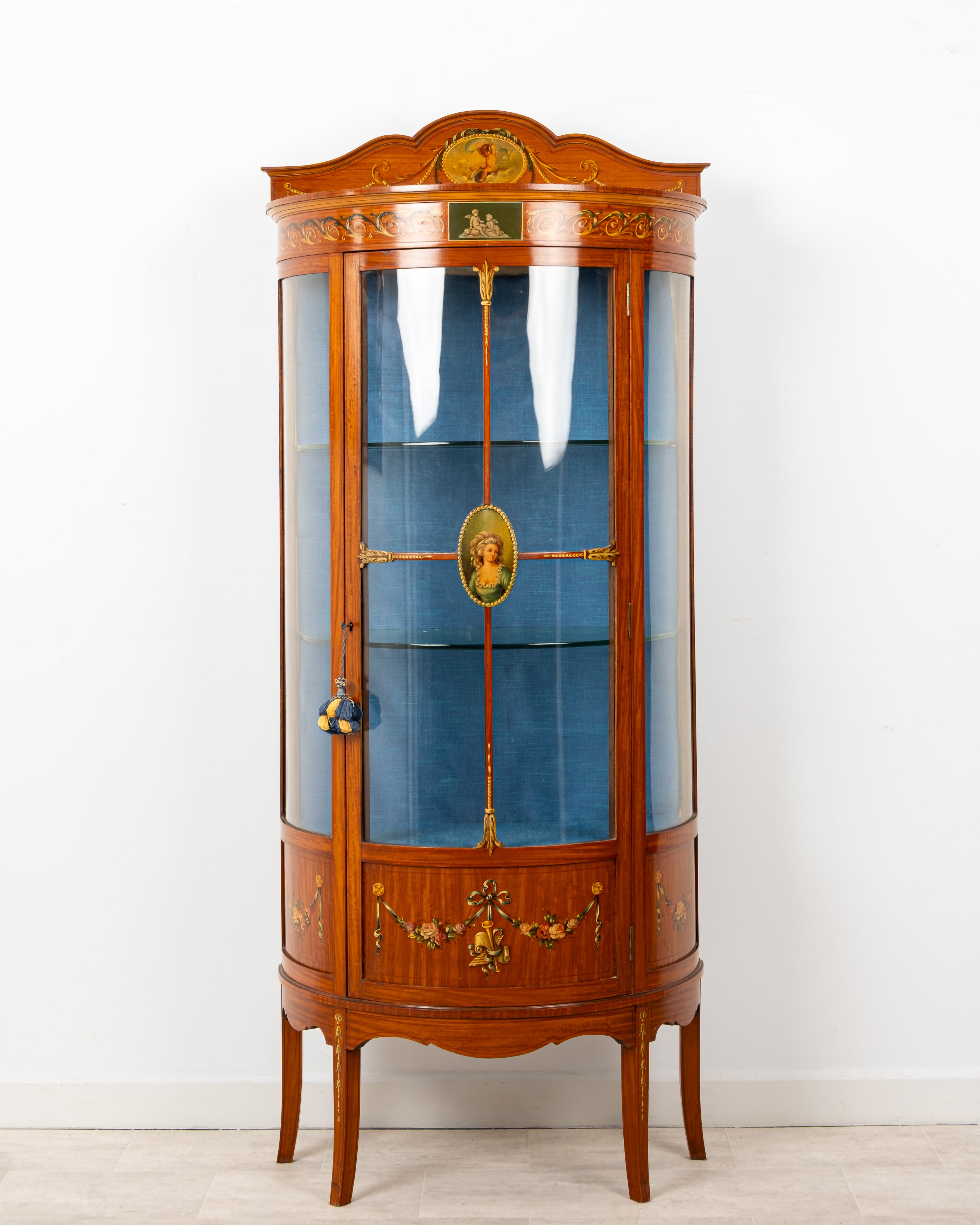 Antique Edwardian satinwood painted bow front display cabinet vitrine c1900 with curved glass panels and blue lined interior