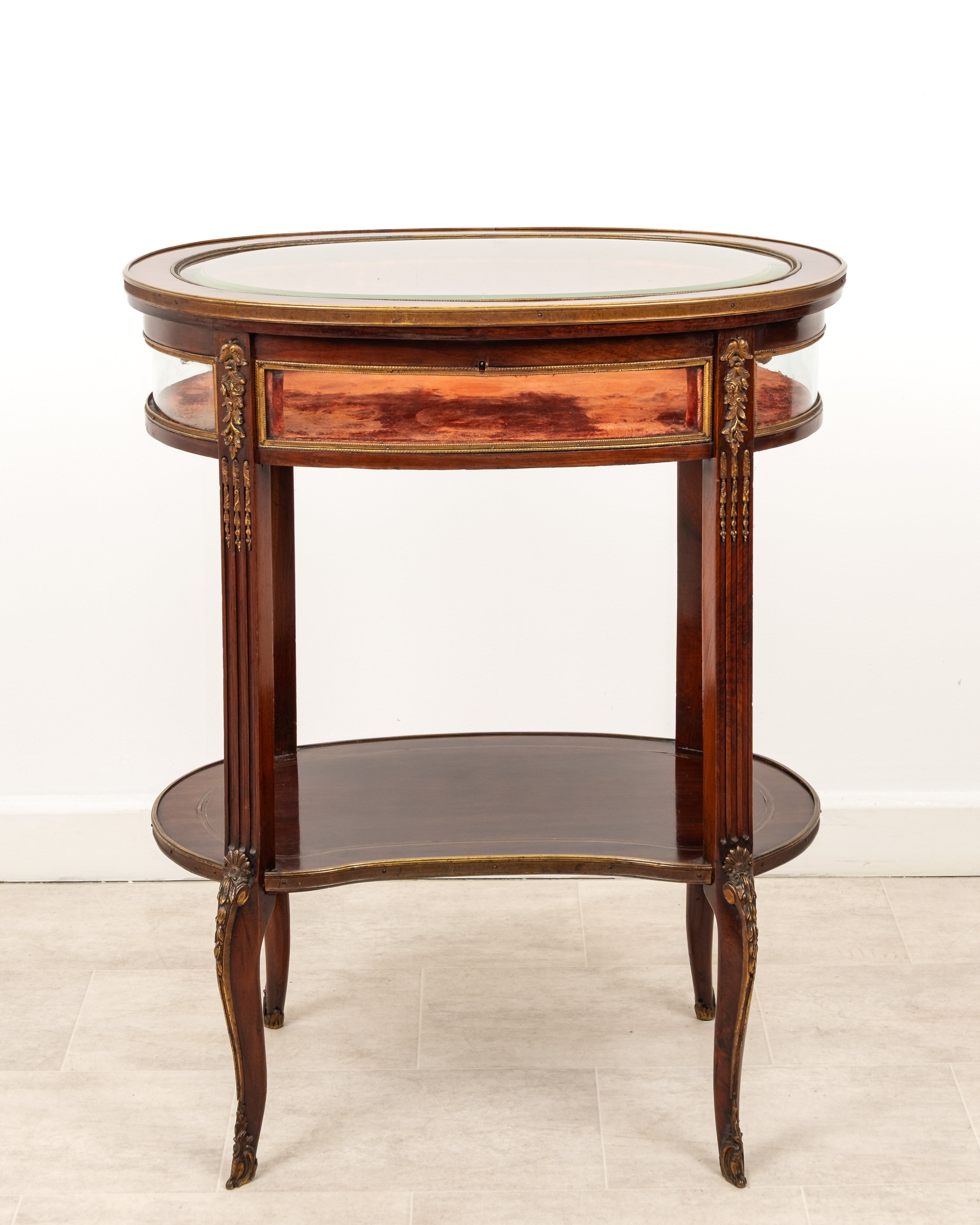 Antique French mahogany bijouterie display table with glazed top and ormolu mounts c1900