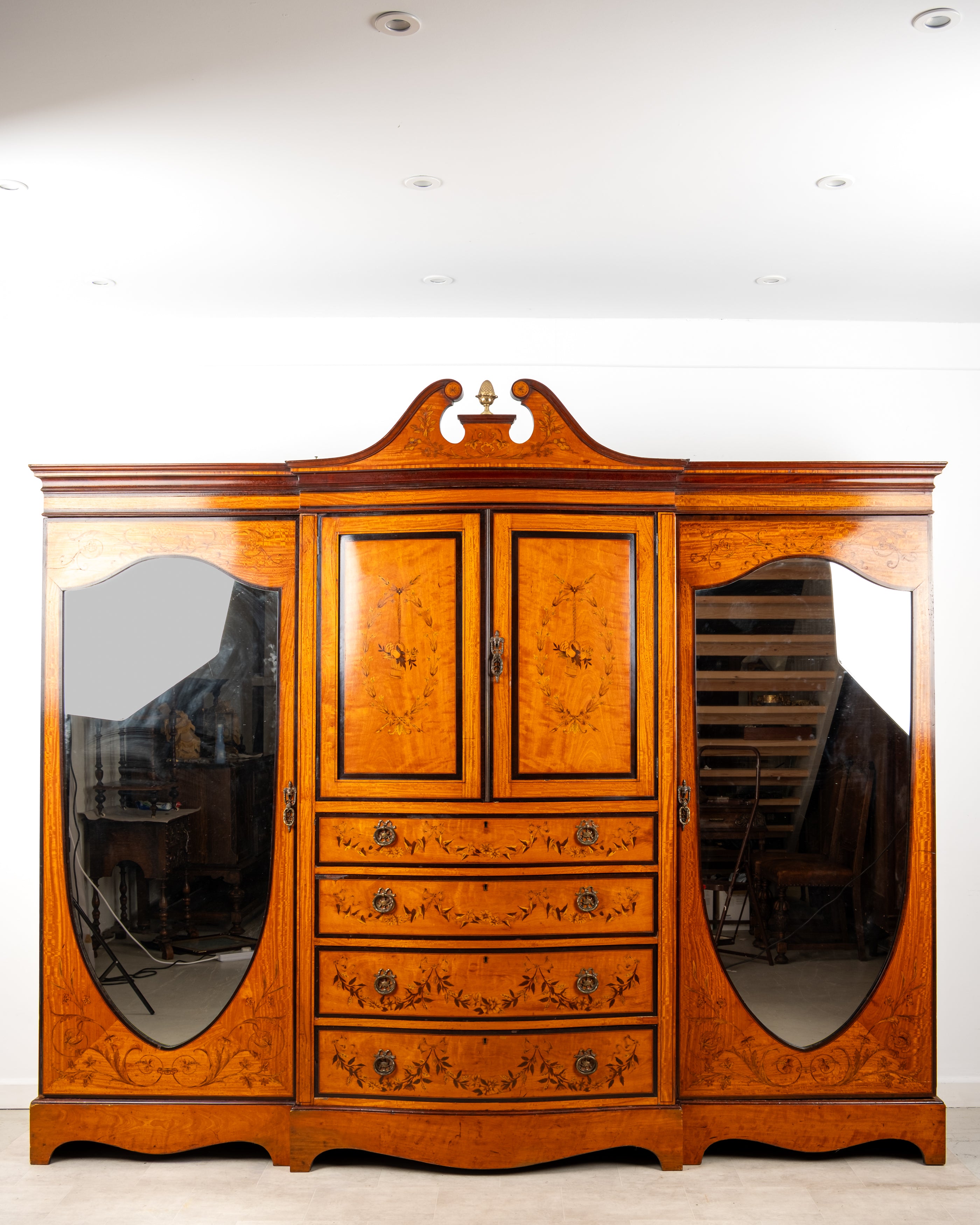 Antique satinwood inlaid compactum wardrobe by Maple and Co with mirrored doors and drawers circa 1900