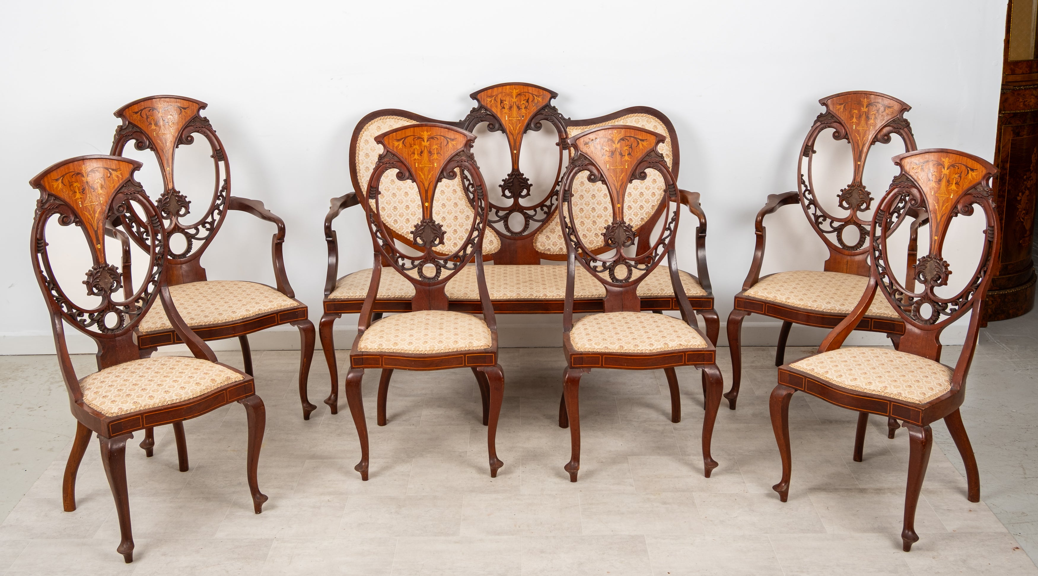 Antique Edwardian mahogany satinwood and marquetry salon suite with settee two armchairs and four chairs circa 1900
