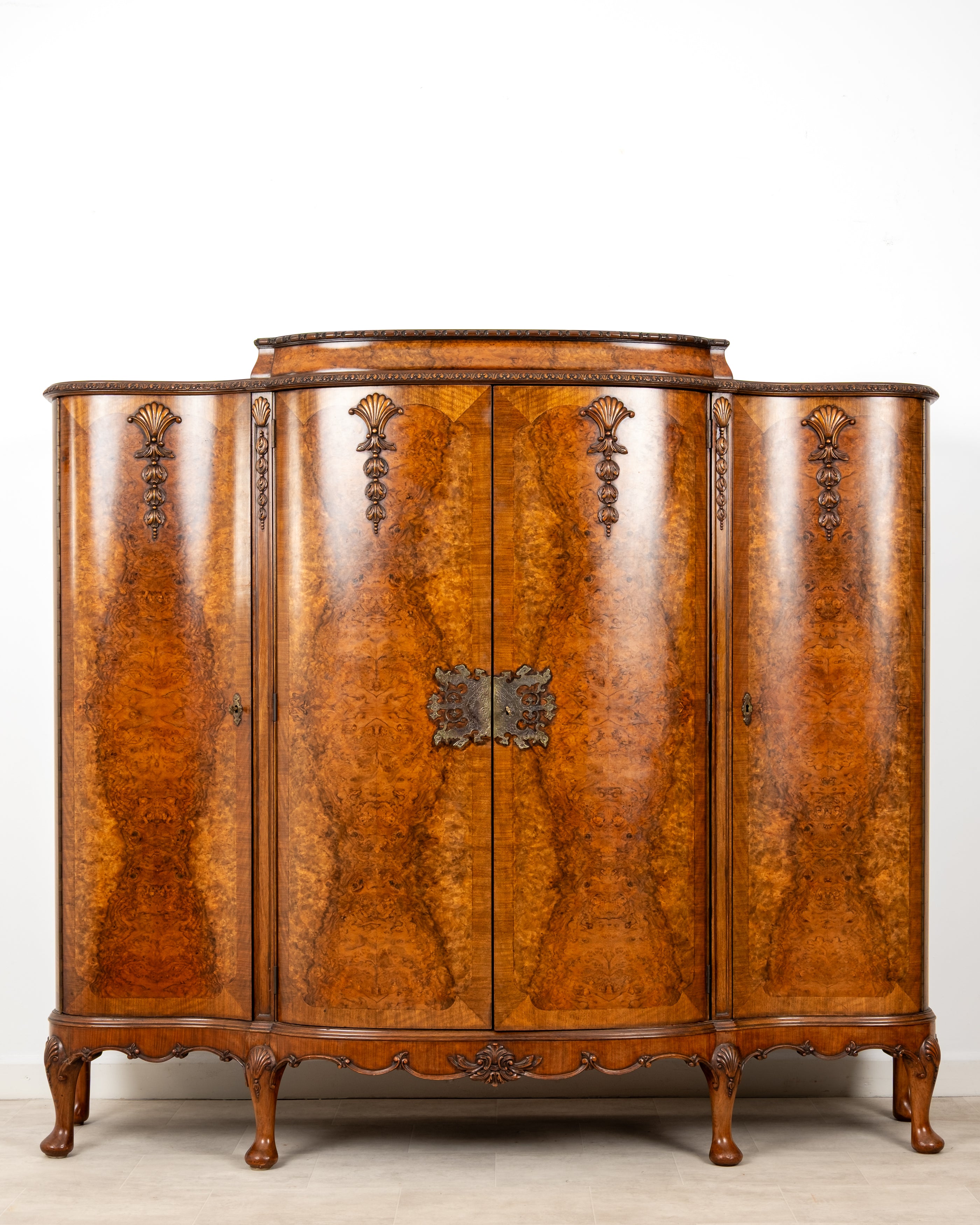 Antique burr walnut cocktail cabinet with fitted mirrored interior circa 1930