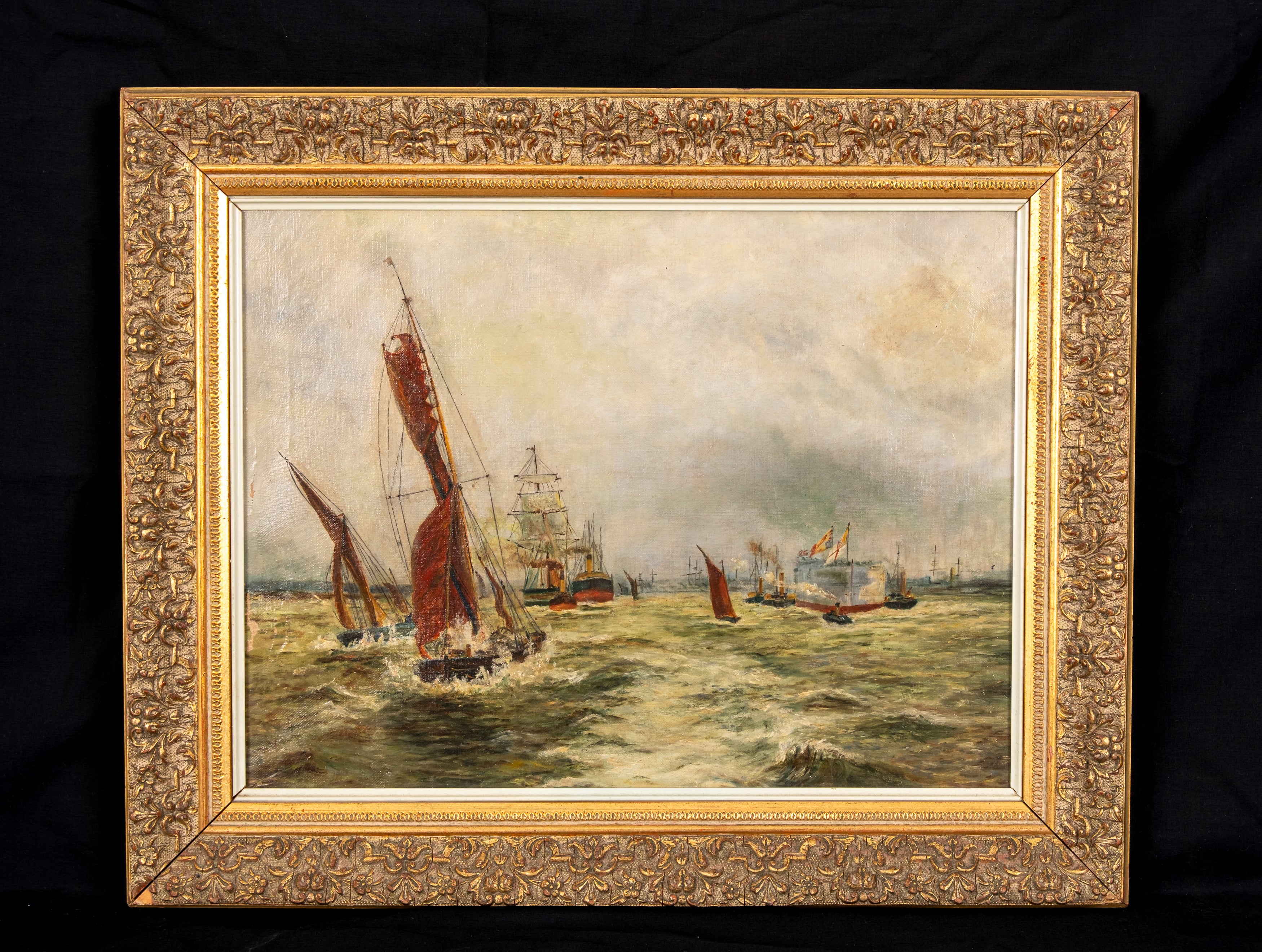Antique British marine oil painting of sailing boats and steamships in a busy harbour, circa 1910, oil on canvas in decorative gilt frame.