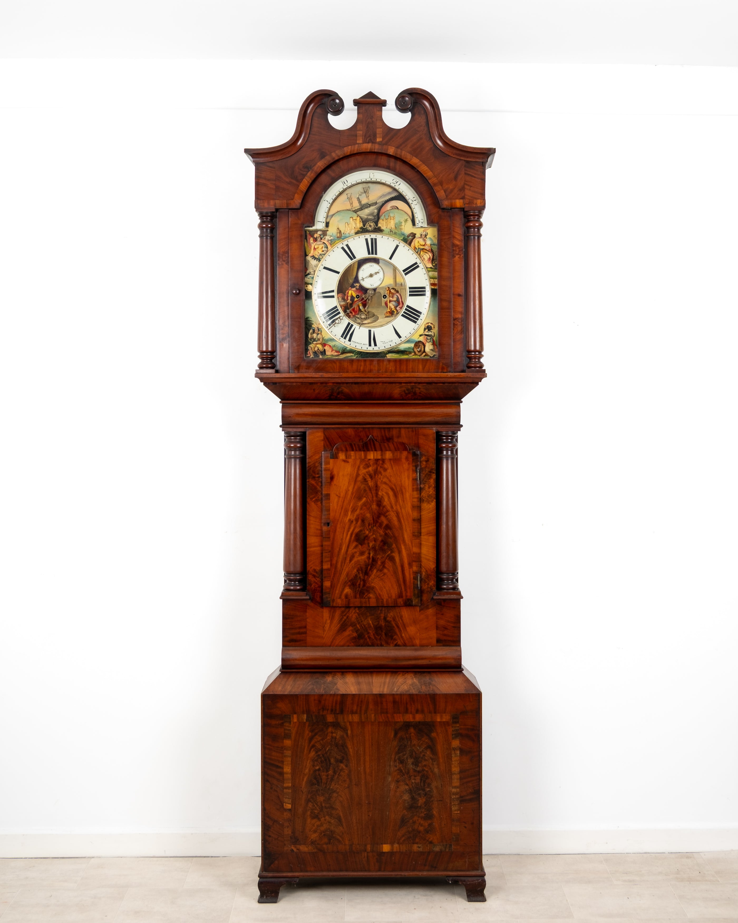 Antique mahogany moon phase longcase clock signed Parkinson Bros Batley