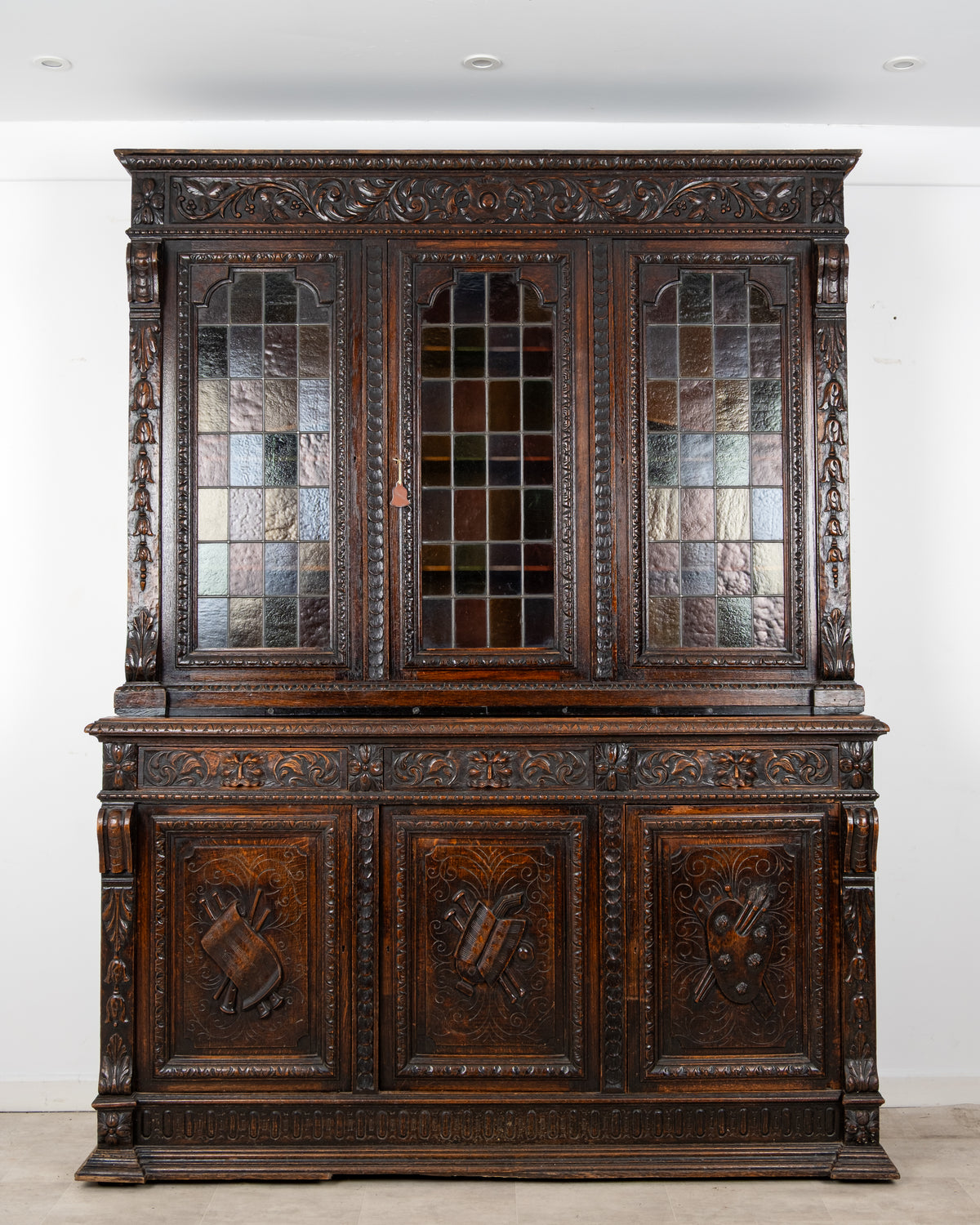 Antique Victorian carved oak stained glass bookcase cabinet c.1890