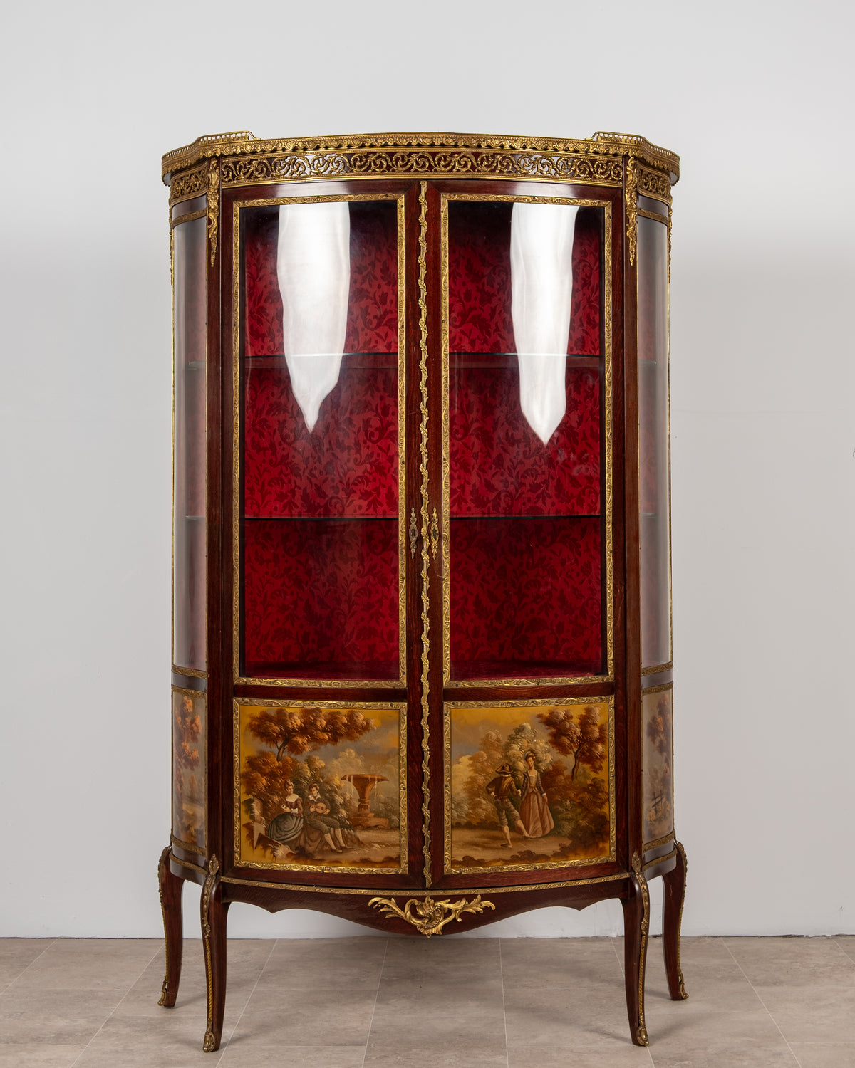 Vintage French style vitrine display cabinet with gilt mounts, pastoral panels and red interior