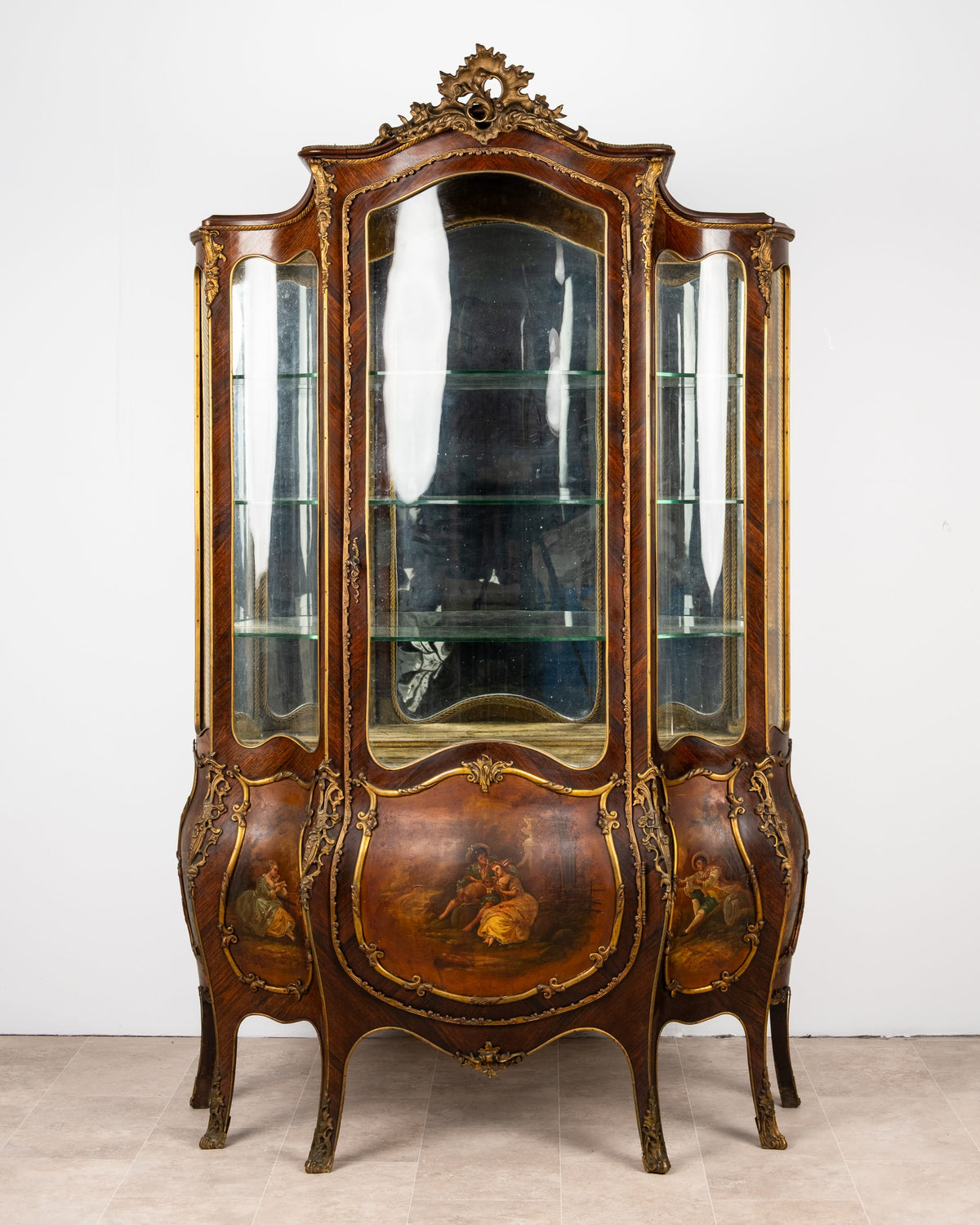 Antique French kingwood vitrine display cabinet with romantic painted panels, gilt-metal mounts and a pierced crest