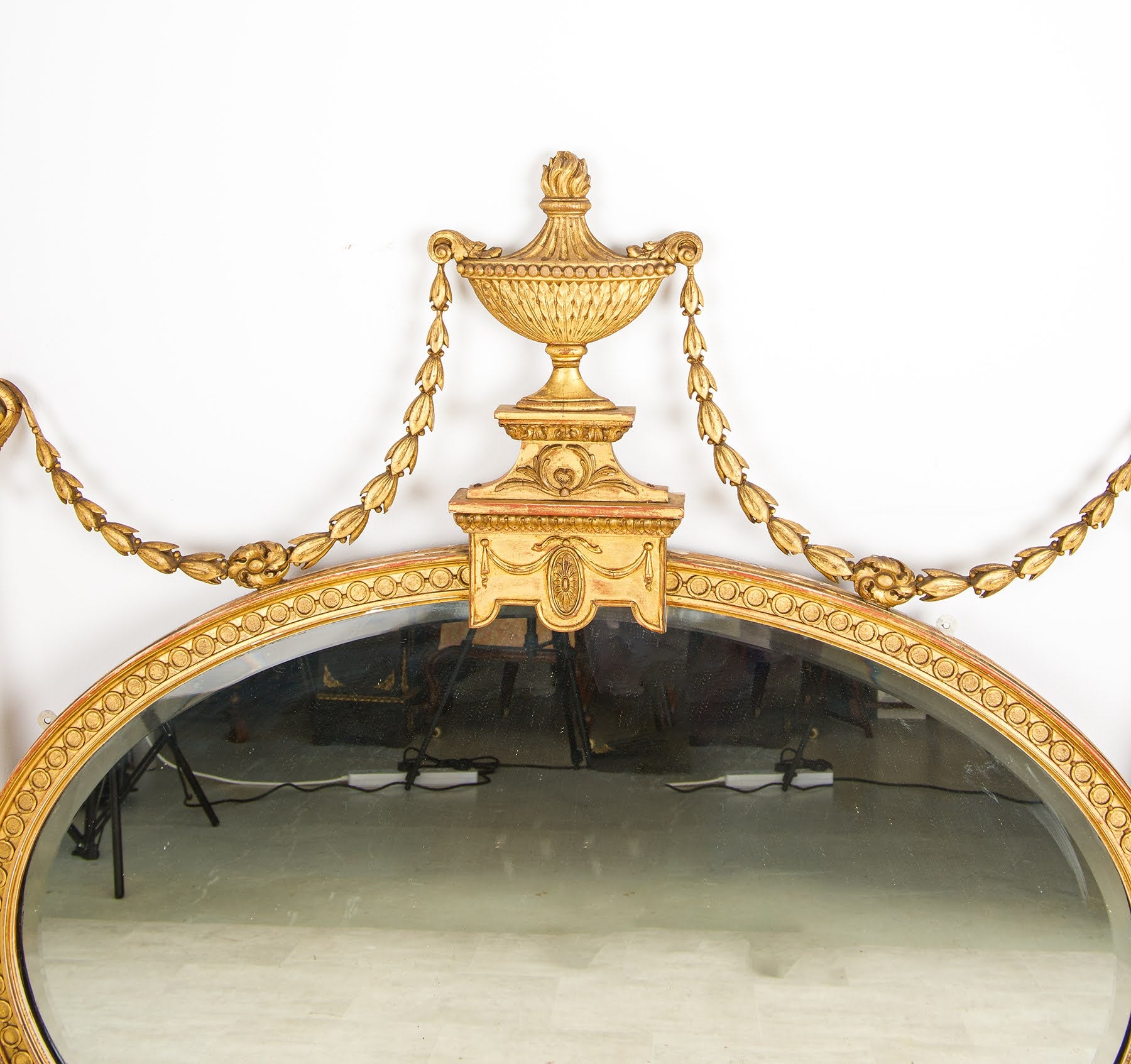 Antique giltwood overmantel mirror flaming urn finial and husk swag garlands detail