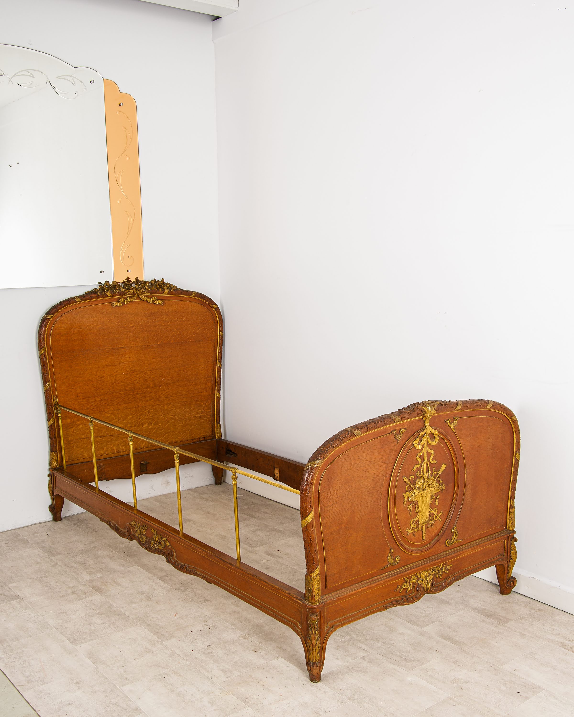 Antique French Louis XV style walnut daybed with gilt decoration