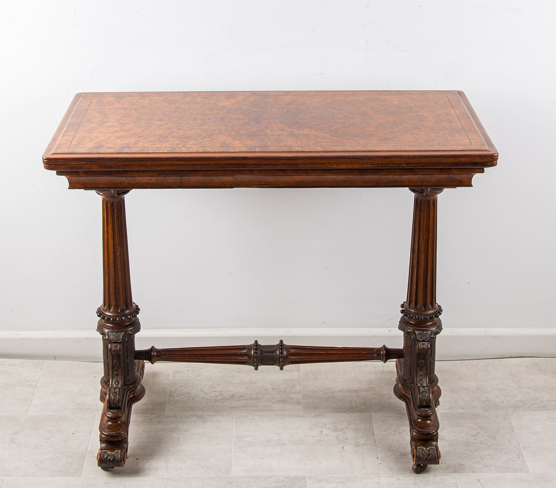 Antique Burr Walnut Fold-Over Games Table with Turned Supports, 19th Century