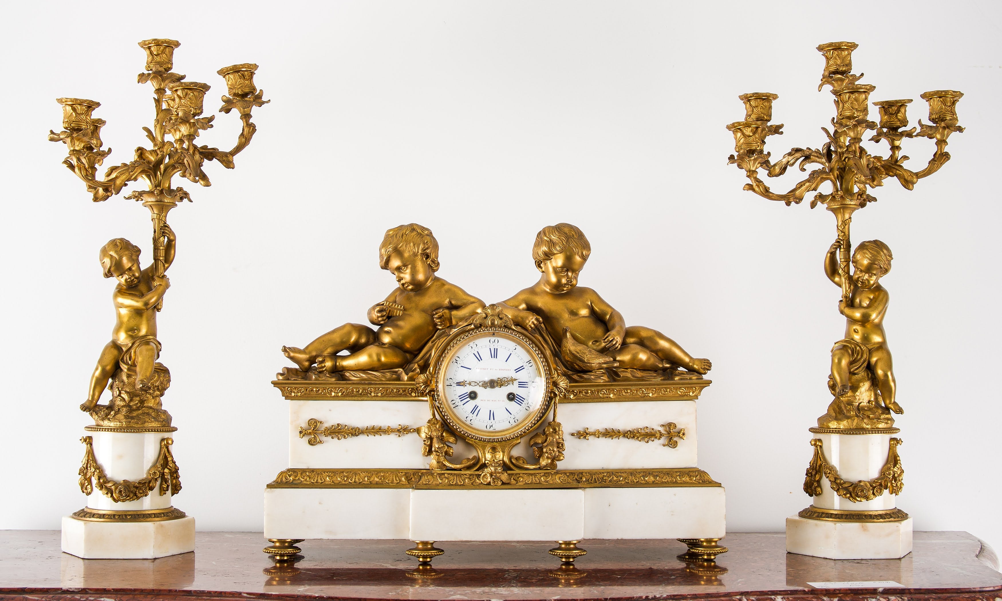 Fine 19th Century French Ormolu & White Marble Clock Garniture with Cherubs