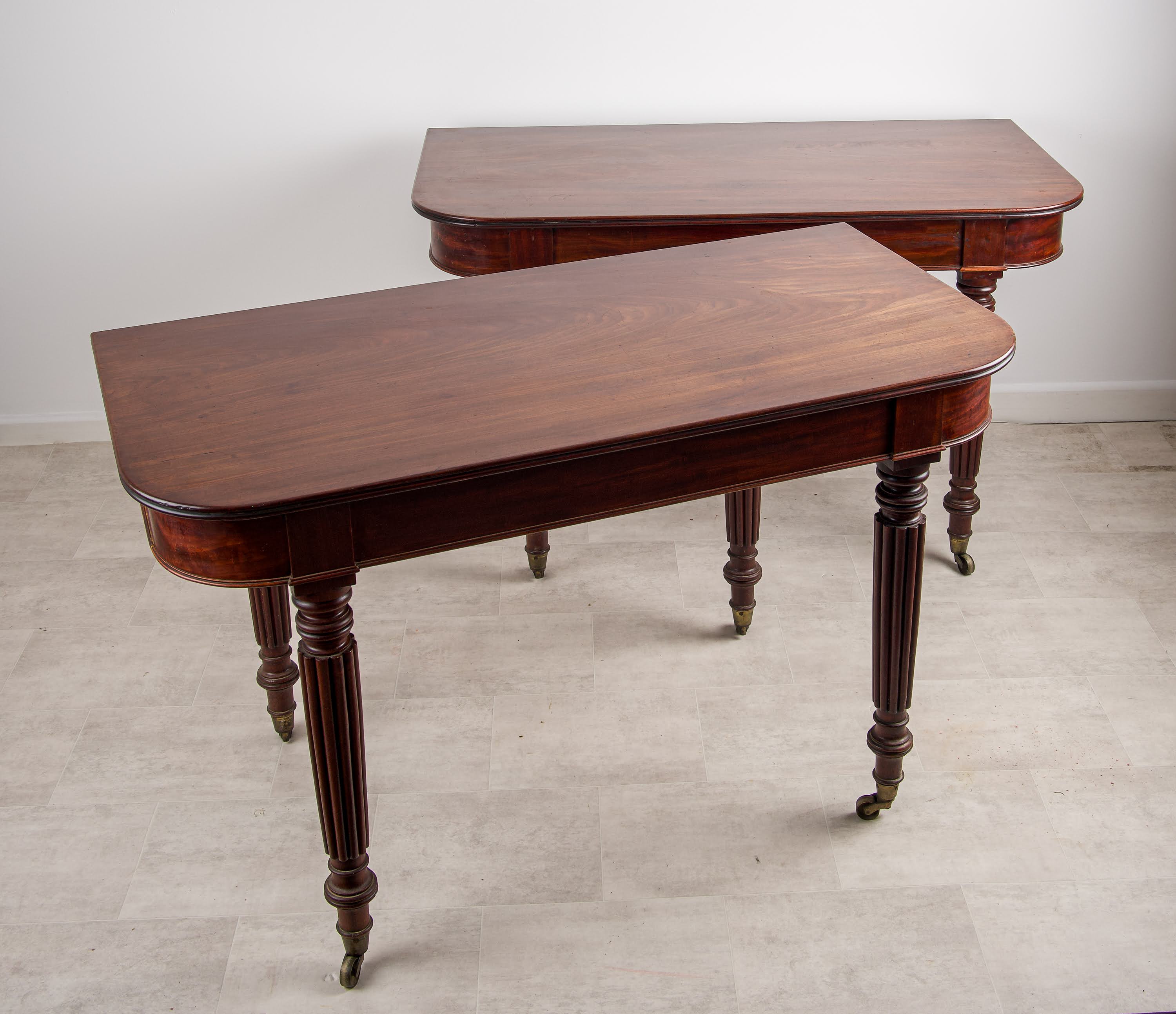 Pair of 19th Century Mahogany Demi-Lune Tables - In the Manner of Gillows