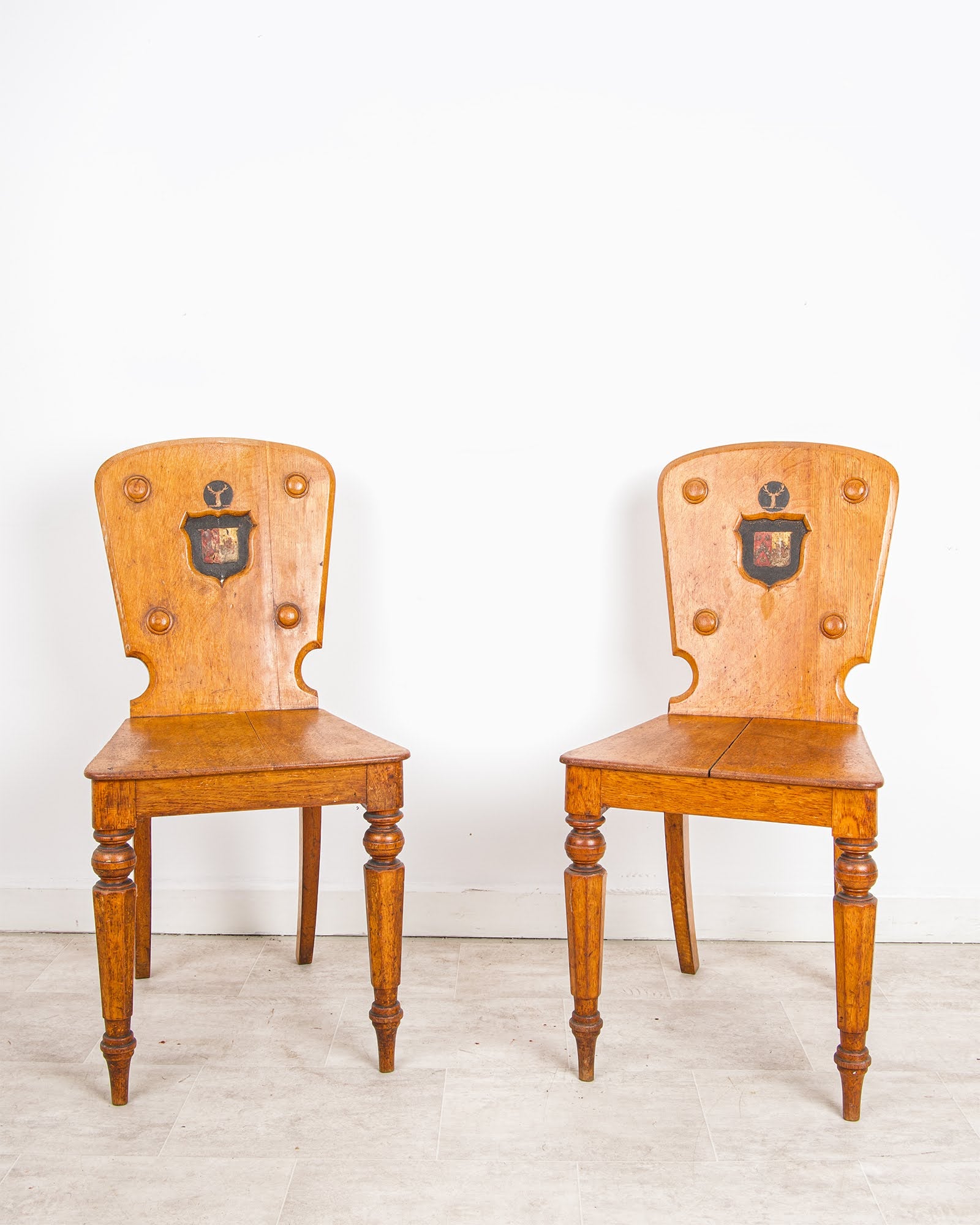 Antique Pair Of Oak Hall Chairs With Heraldic Shield Backs